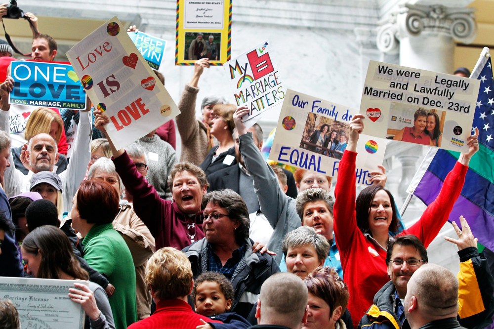 Supporters of gay marriage fill the rotunda as they gather to rally at the Utah State Capitol, Jan. 10, 2014.