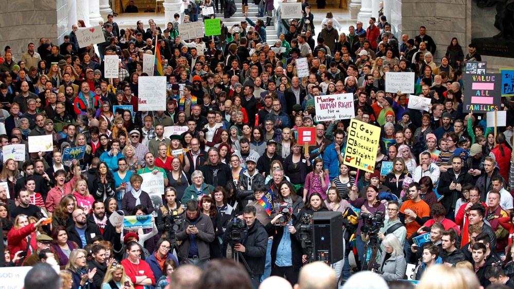 Supporters of gay marriage fill the rotunda as they gathered to rally at the Utah State Capitol Friday Jan. 10, 2014.