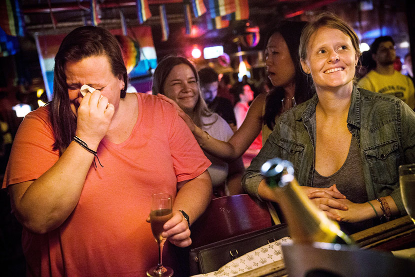 (L-R) Rachel Howald, Kate Lummus, Virginia Sin and Gretchen Menter celebrate after the Supreme Court ruled key portions of the Defense of Marriage Act (DOMA) unconstitutional, at the Stonewall Inn on June 26, 2013 in the West Village neighborhood of...