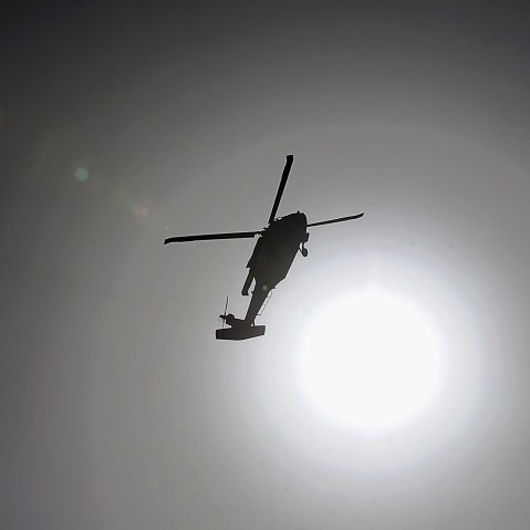 A U.S. military helicopter flies. (Photo by Shah Marai/AFP/Getty)