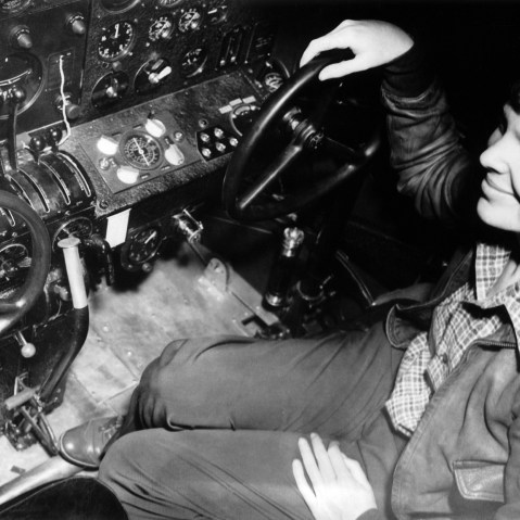 A closeup of Amelia Earhart seated at the control of her new airplane the Flying Laboratory, March 12, 1937, Oakland, Calif. (Photo by Keystone-France/Getty)