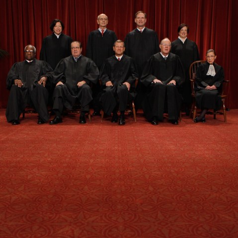 U.S. Associate Justices Clarence Thomas, Antonin Scalia, Chief Justice John Roberts, Associate Justices Anthony Kennedy, Ruth Bader Ginsburg, Sonia Sotomayor, Stephen Breyer, Samuel Alito and Elena Kagan. (Photo by Chip Somodevilla/Getty)