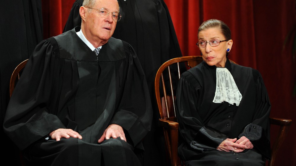 U.S. Supreme Court Associate Justice Anthony M. Kennedy and Associate Justice Ruth Bader Ginsburg participate in the courts official photo session, Oct. 8, 2010. (Photo by Tim Sloan/AFP/Getty)