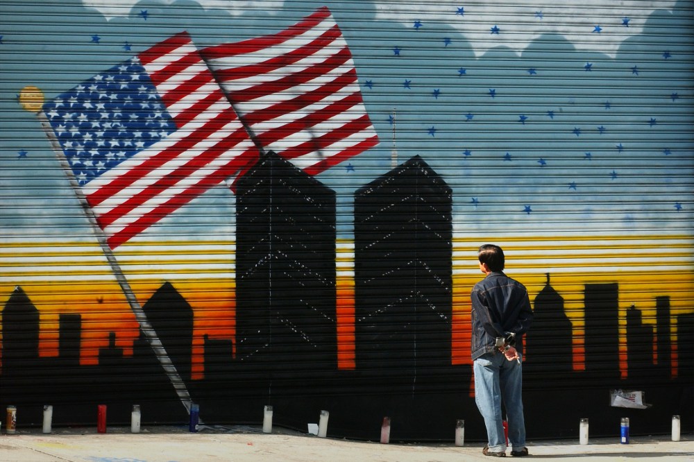 A man pauses to look at a mural in Brooklyn on Sept. 18, 2001 in memory of the World Trade Center and the over 5,000 people who died in the terrorist attack. (Photo by Spencer Platt/Getty)