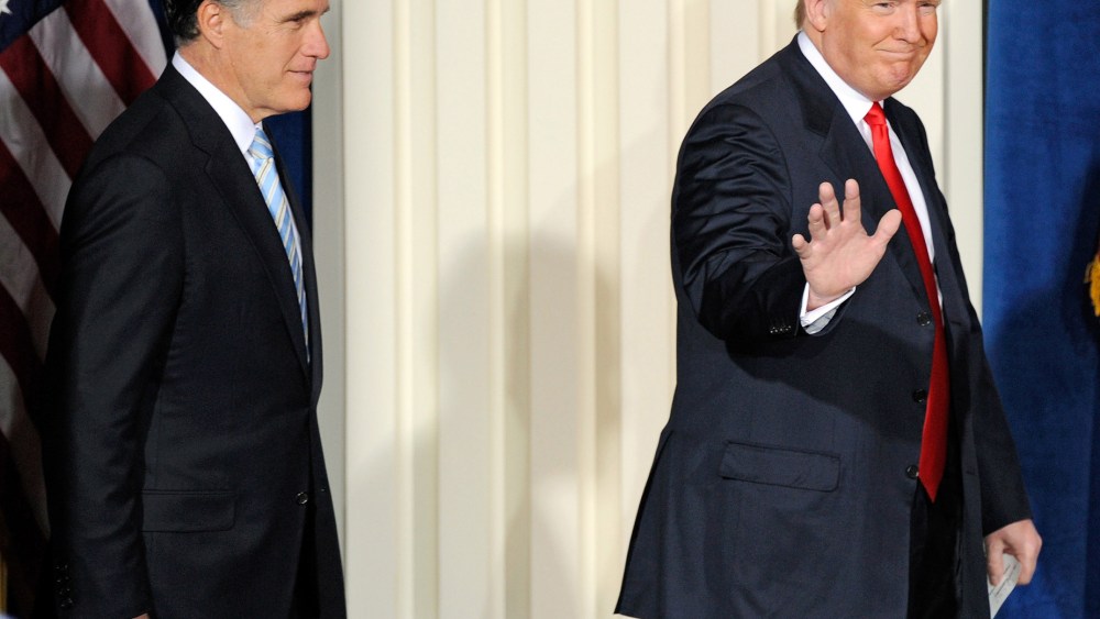 Then-Republican presidential candidate Mitt Romney and Donald Trump arrive at a news conference held by Trump to endorse Romney for president at the Trump International Hotel & Tower Las Vegas, Feb. 2, 2012. (Photo by Ethan Miller/Getty)