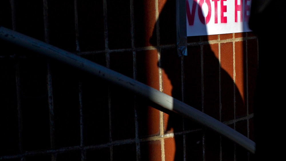 A voter enters a polling station to cast their ballot in the "Super Tuesday" Republican presidential primary at the Russell Apartments March 6, 2012 in Cambridge, Mass. (Photo by Win McNamee/Getty)