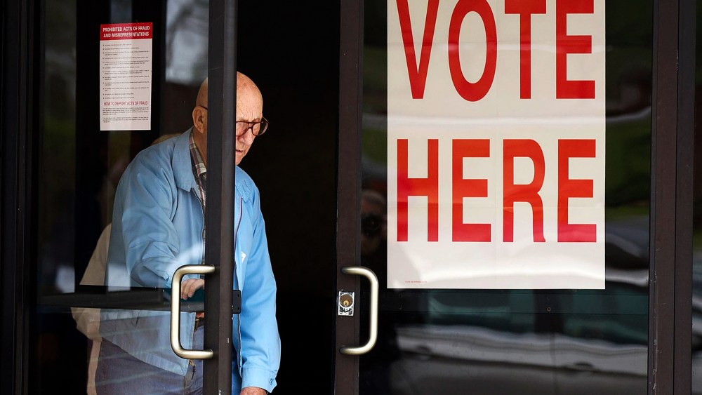 A voter leaves the First Baptist Church Pelham Annex after casting his ballot in the Republican Presidential Primary March 13, 2012 in Pelham, Ala. (Photo by Win McNamee/Getty)