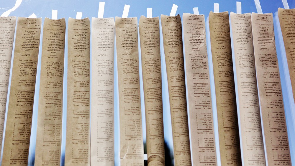 Sample ballots from digital voting machines are taped to a window during the presidential primary election on April 3, 2012 in Potomac, Maryland. (Photo by Chip Somodevilla/Getty)