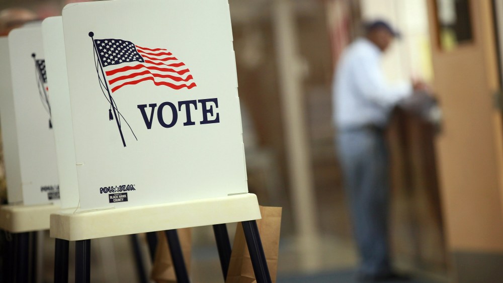 Voting booths are set up for early voting at the Black Hawk County Courthouse on September 27, 2012 in Waterloo, Iowa. (Photo by Scott Olson/Getty)