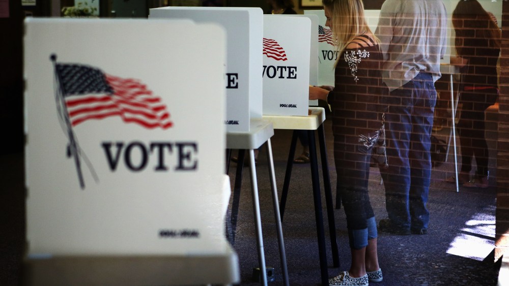 Residents vote at a polling place on the campus of the University of Northern Iowa (UNI) on Sept. 28, 2012 in Cedar Falls, Iowa. (Photo by Scott Olson/Getty)