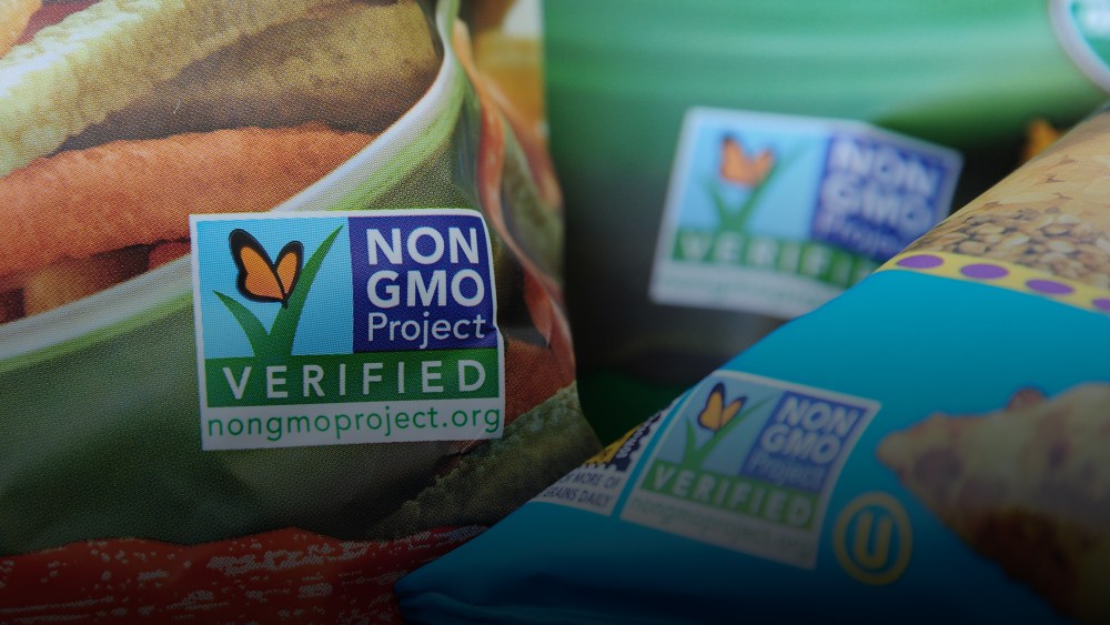 Labels on bags of snack foods indicate they are non-GMO food products, in Los Angeles, Calif. (Photo by Robyn Beck/AFP/Getty)