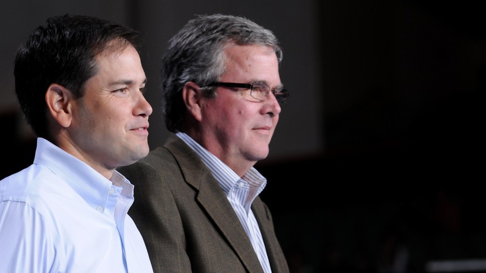 Senator Marco Rubio and then-Governor Jeb Bush attend Mitt Romney victory campaign Rally at Bank United Center on Oct. 31, 2012 in Miami, Fl. (Photo by Vallery Jean/FilmMagic/Getty)