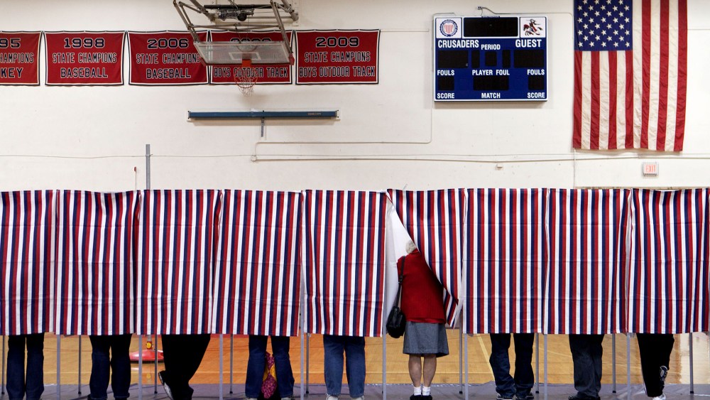 Voters in Manchester, N.H., on Election Day. (Photo by Kayana Szymczak/The Boston Globe/Getty)