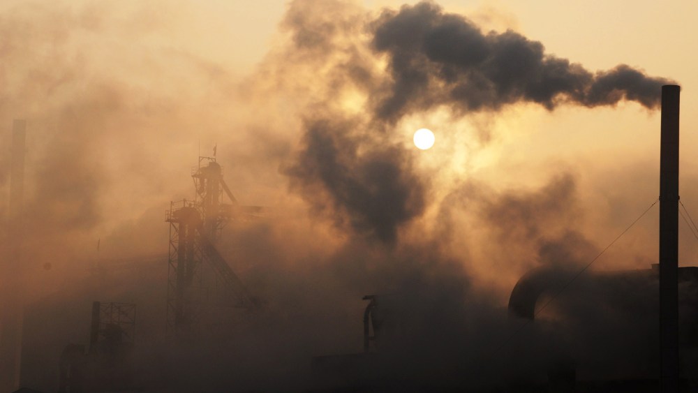 A cement factory releasing heavy smoke in Binzhou, in eastern China's Shandong province on Jan. 17, 2013. (Photo by STR/AFP/Getty)
