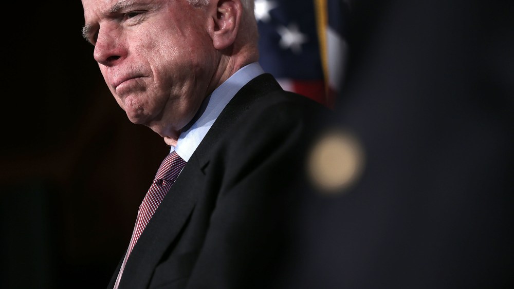 U.S. Senator John McCain (R-AZ) listens during a news conference on the terror attack that killed four Americans in Benghazi Feb. 14, 2013 on Capitol Hill in Washington, DC. (Photo by Alex Wong/Getty)