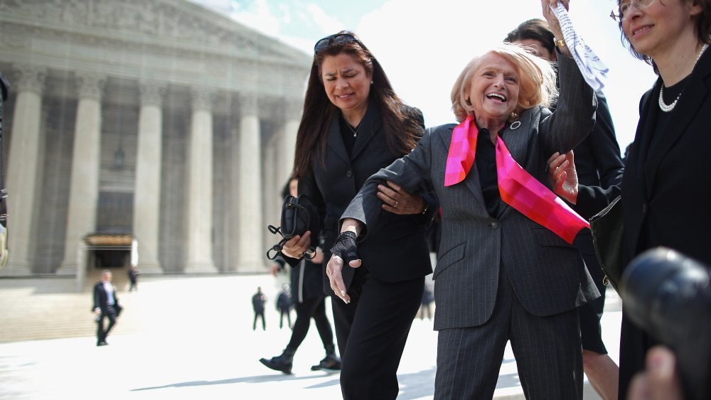 Edith Windsor acknowledges her supporters as she leaves the Supreme Court March 27, 2013 in Washington, DC. (Photo by Chip Somodevilla/Getty)