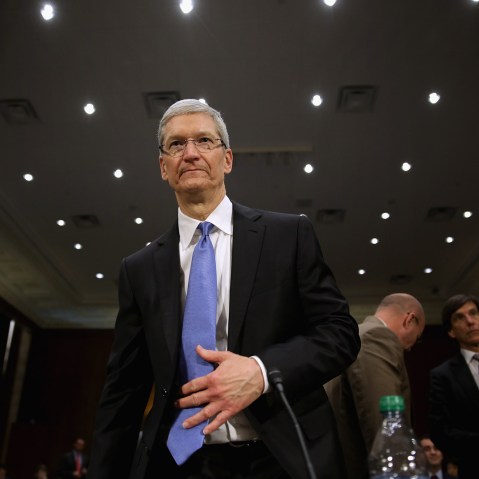 Apple CEO Timothy Cook returns from a break in his testimony during a hearing in the Dirksen Senate Office Building on Capitol Hill May 21, 2013 in Washington, D.C. (Photo by Chip Somodevilla/Getty)