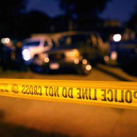 Police tape. (Photo by Scott Olson/Getty)