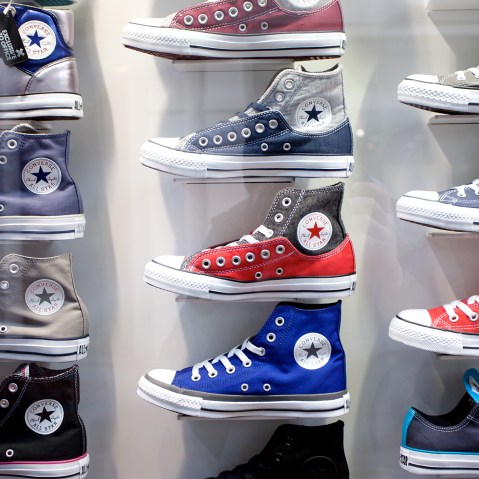 Converse boots in shop window on Carnaby Street, London. (Photo by PYMCA/UIG/Getty)