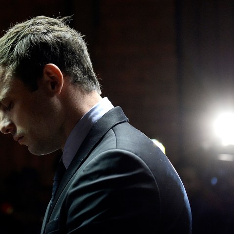 South African Paralympic sprinter Oscar Pistorius appears at the Magistrate Court in Pretoria on August 19, 2013. (Photo by Stephane De Sakutin/AFP/Getty)
