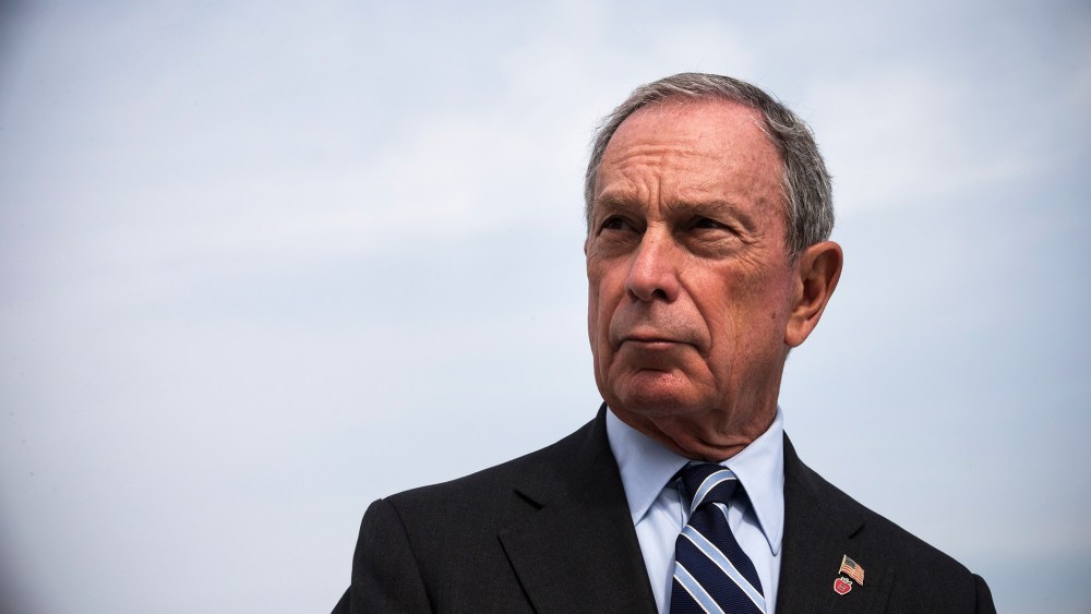 Then, New York City Mayor Michael Bloomberg speaks at a press conference on Aug. 19, 2013 in the Greenpoint neighborhood of the Brooklyn Borough of New York, N.Y. (Photo by Andrew Burton/Getty)