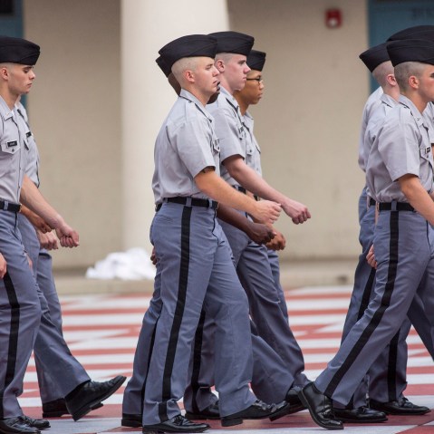 Citadel freshman cadets known as knobs drill for the first time in their new uniforms on Aug. 19, 2013 in Charleston, S.C. (Photo by Richard Ellis/Getty)