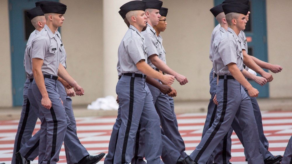 Citadel freshman cadets known as knobs drill for the first time in their new uniforms on Aug. 19, 2013 in Charleston, S.C. (Photo by Richard Ellis/Getty)