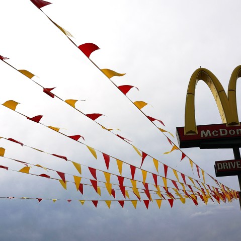 Flags fly in a a McDonald's parking lot on Aug. 23, 2013 in the Brooklyn borough of New York City. (Photo by Spencer Platt/Getty)