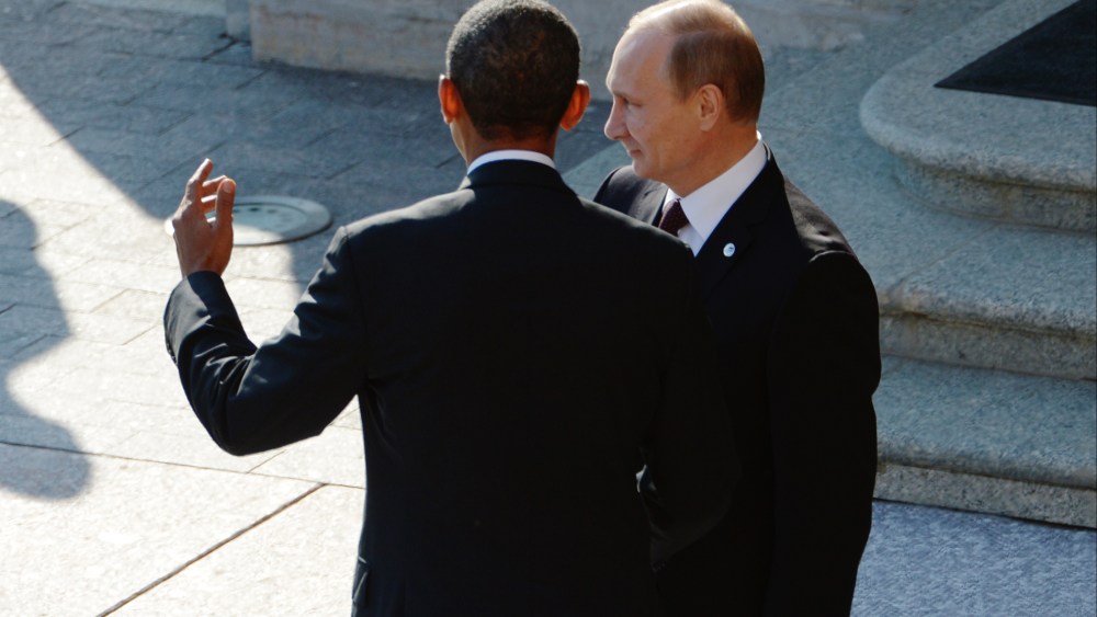 Russian President Vladimir Putin greets U.S. President Barack Obama at the G20 summit on September 5, 2013 in St. Petersburg, Russia. (Photo by Alexei Danichev/Host Photo Agency/Getty)