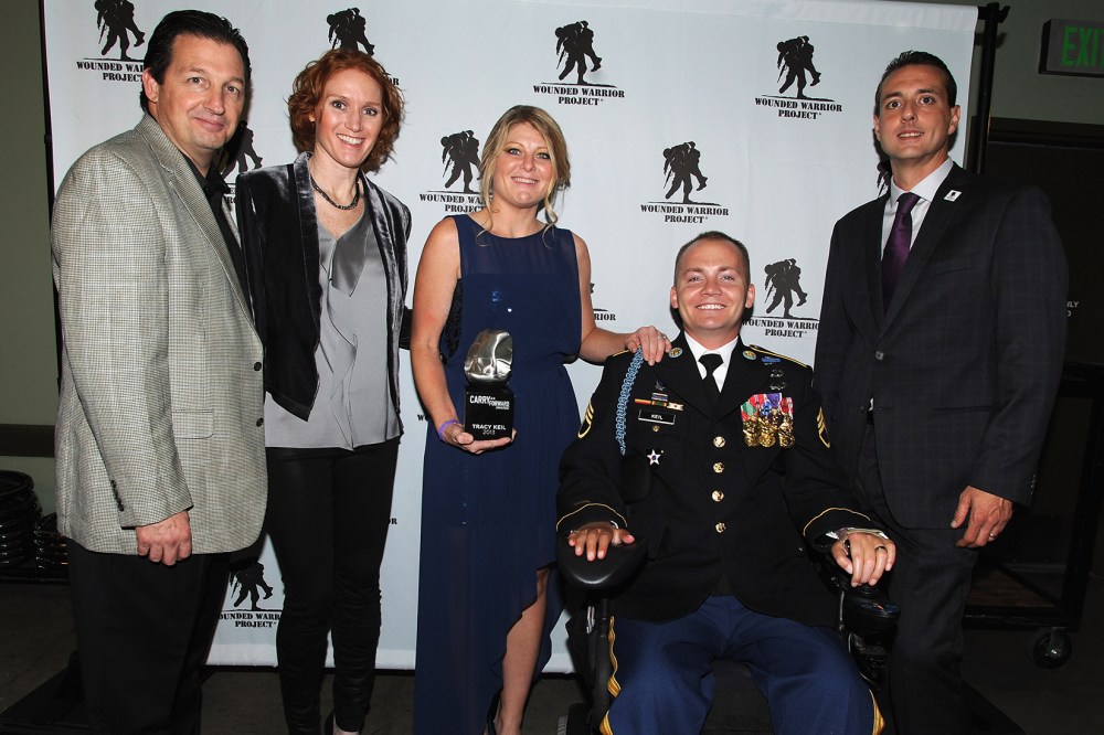 Al Giordano (far left), Steve Nardizzi (far right) and The Carry Forward Awardees attends the Wounded Warrior Project Carry Forward Awards Show at Club Nokia on Oct. 10, 2013 in Los Angeles, Calif. (Photo by Bobby Bank/WireImage/Getty)