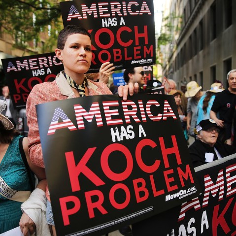 Activists hold a protest near the Manhattan apartment of billionaire and Republican financier David Koch on June 5, 2014 in New York City. (Photo by Spencer Platt/Getty)