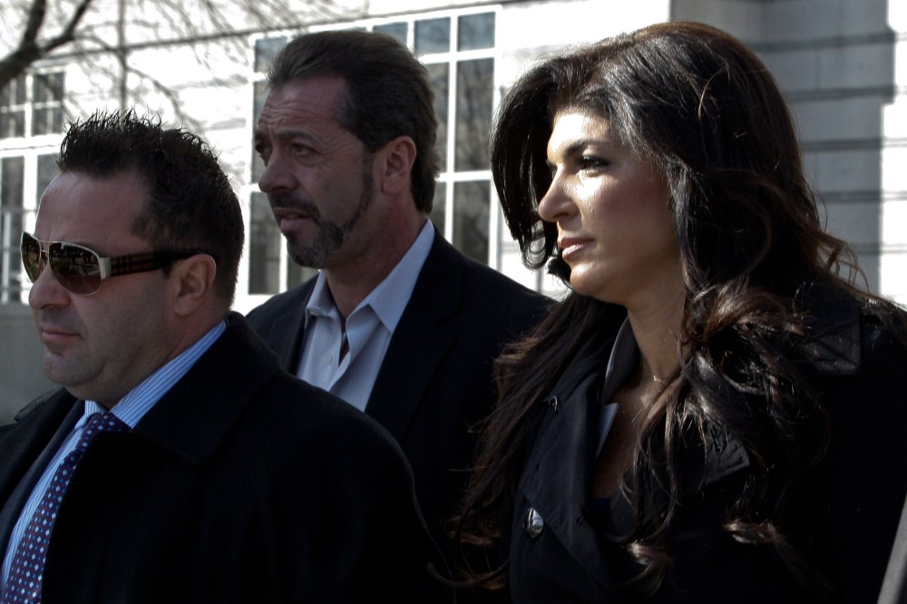 Teresa Giudice and her husband Giuseppe 'Joe' Giudice leave Newark federal court on Nov. 20, 2013 in Newark, N.J. (Photo by Kena Betancur/Getty)