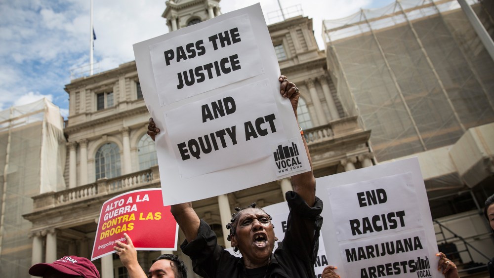 Elizabeth Owens protests on the steps of New York City Hall in support of the Fairness and Equity Act on July 9, 2014 in New York City. (Photo by Andrew Burton/Getty)