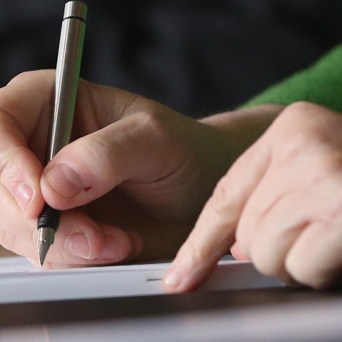 Writing. (Photo by Sean Gallup/Getty)