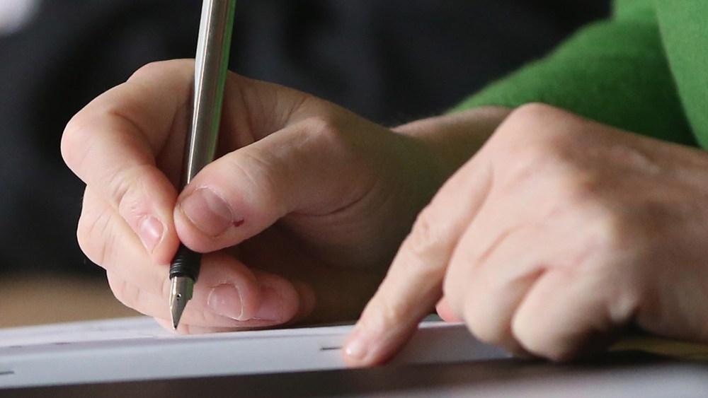 Writing. (Photo by Sean Gallup/Getty)