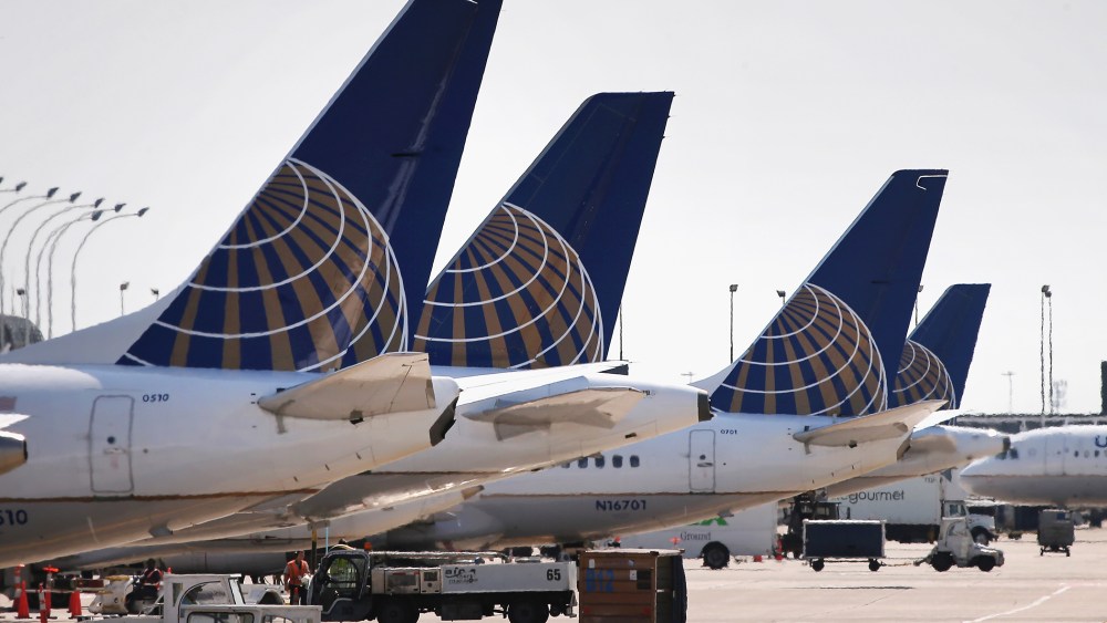United Airlines jets sit at gates at O'Hare International Airport in Chicago, Ill. (Photo by Scott Olson/Getty)