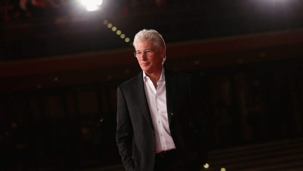 Richard Gere walks on the red carpet during the 9th Rome Film Festival on Oct. 19, 2014 in Rome, Italy. (Photo by Vittorio Zunino Celotto/Getty)