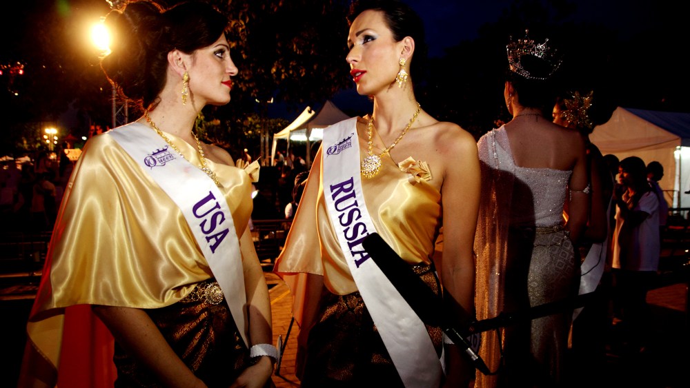 Contestants for Miss Queen International 2014, Transgender beauty pageant Miss Samira Sitara from USA speak with Miss Veronika Svetlova from Russia at the Loy Krathong festival ceremony in Bangkok. (Photo by Piti A Sahakorn/LightRocket/Getty)