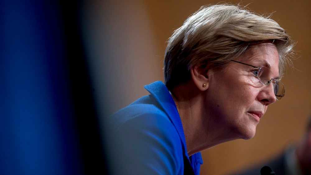 Senator Elizabeth Warren (D-Mass.) listens during a hearing in Washington, D.C., on Nov. 21, 2014. (Photo by Andrew Harrer/Bloomberg/Getty)