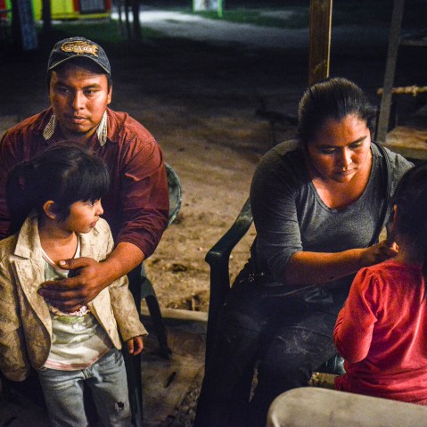 Ramiro Beltran and his wife Alma Hernandez Beltran, both undocumented immigrants, sit with their daughters who are U.S. citizens, Kimberly Beltran and Kayla Beltran, in Alamo, Texas, Nov. 24, 2014. (Photo by Matthew Busch for The Washington Post/Getty)