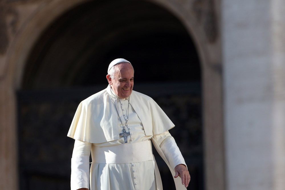 Pope Francis attends his weekly audience in St. Peter's Square on Dec. 17, 2014 in Vatican City, Vatican. (Photo by Franco Origlia/Getty)
