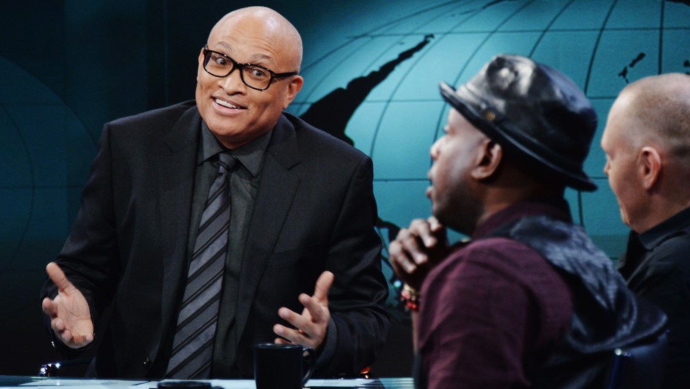 Larry Wilmore jokes with hip-hop artist/activist Talib Kweli and comedian Bill Burr on the debut episode of Comedy Central's "The Nightly Show with Larry Wilmore" on Jan. 19, 2015 in New York City. (Photo by Stephen Lovekin/Comedy Central/Getty)