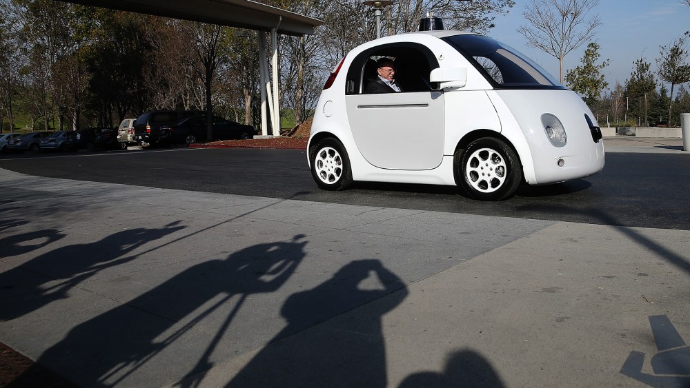 Google Chairman Eric Schmidt sits in a Google self-driving car at the Google headquarters on Feb. 2, 2015 in Mountain View, Calif. (Photo by Justin Sullivan/Getty)