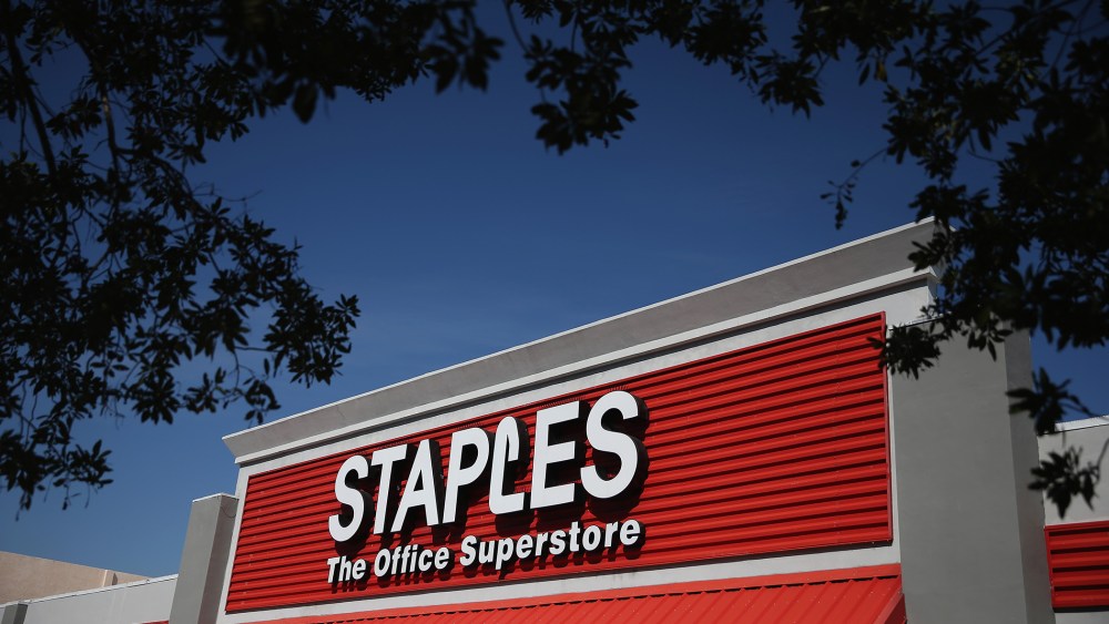 The sign logo for a Staples store is seen on Feb. 3, 2015 in Miami, Fl. (Photo by Joe Raedle/Getty)