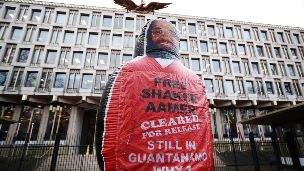 A giant inflatable figure of Shaker Aamer is pictured during a protest outside the U.S embassy on Feb. 13, 2015 in London, England. (Photo by Carl Court/Getty)