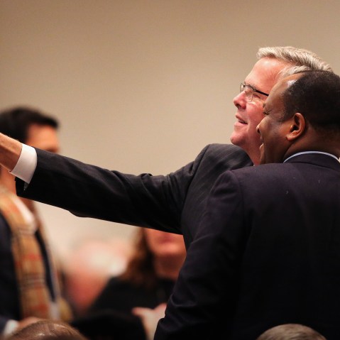 Former Florida Governor Jeb Bush takes a selfie with a guest at a luncheon on Feb. 18, 2015 in Chicago, Ill. (Photo by Scott Olson/Getty)