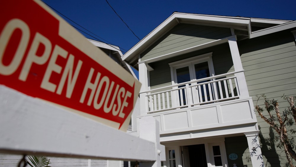 Open House signage is displayed outside of a home for sale in Redondo Beach, Calif., Feb. 14, 2015. (Photo by Patrick T. Fallon/Bloomberg via Getty)