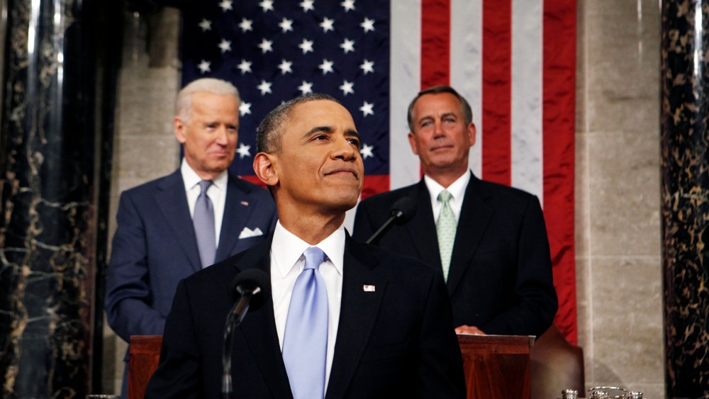 President Barack Obama smiles as he arrives to deliver his State of the Union speech on Capitol Hill on Jan. 28, 2014 in Washington, D.C. (Photo by Larry Downing/Pool/Getty)