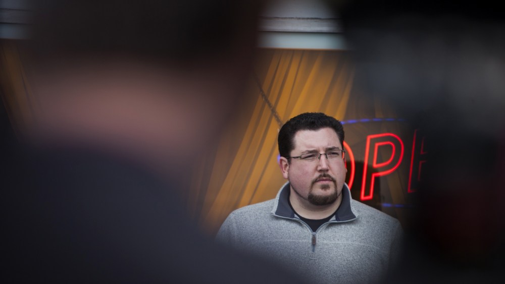 Ferguson Mayor James Knowles stands with members of the business community during a press conference in Ferguson, Mo., March 14, 2015. (Photo by Samuel Corum/Anadolu Agency/Getty)