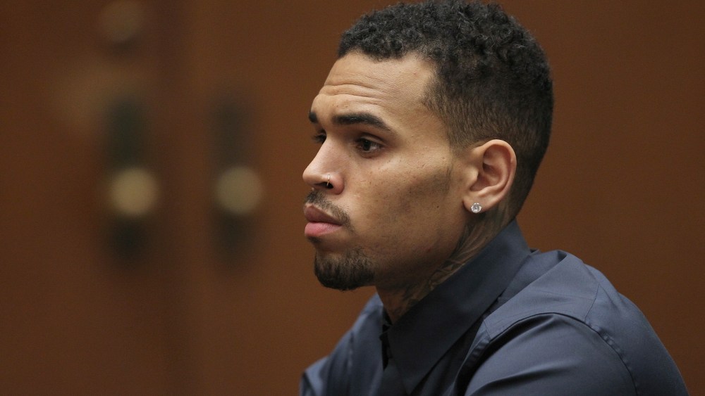 R&B singer Chris Brown appears in court for a probation progress hearing on Feb. 3, 2014 in Los Angeles, Calif. (Photo by David McNew/Getty)